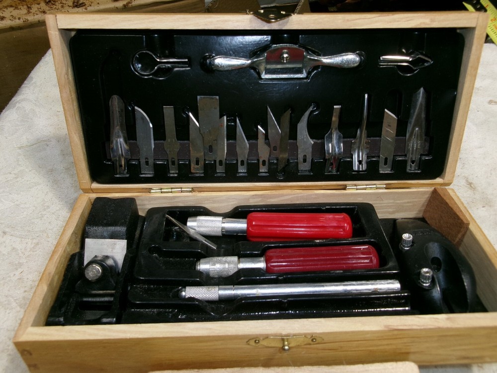 X-ACTO knife set.   22 blades, three handles, plane, spoke shave, etc. Very nice