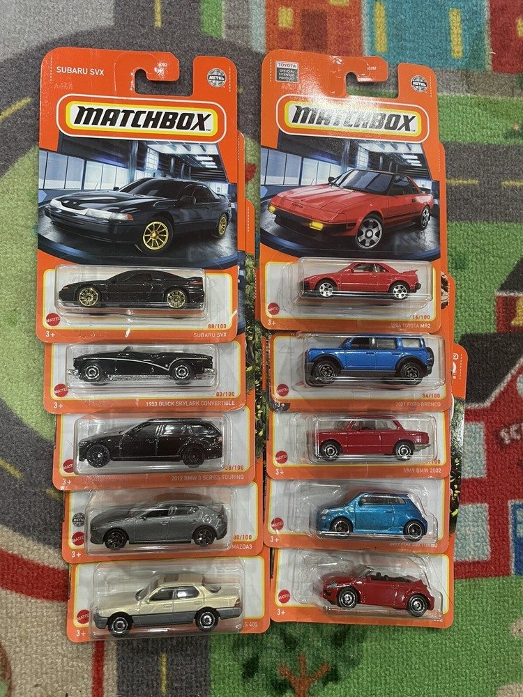 MATCHBOX MIXED LOT 10 OF DIECAST CARS /TRUCKS ALL CARDED 1/64 LT3