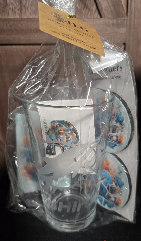Miami Dolphin Gift Bag Set, Mug, Car Coasters, Key chain, And Air freshener.