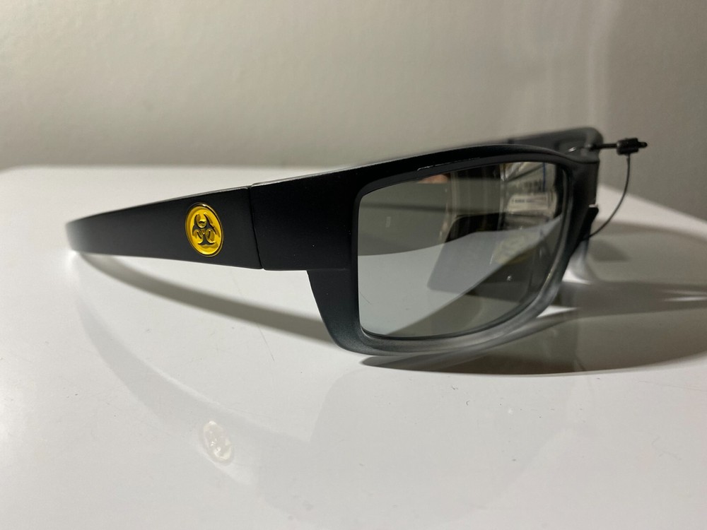 Men's black frame riding sunglasses with smoke gray lenses