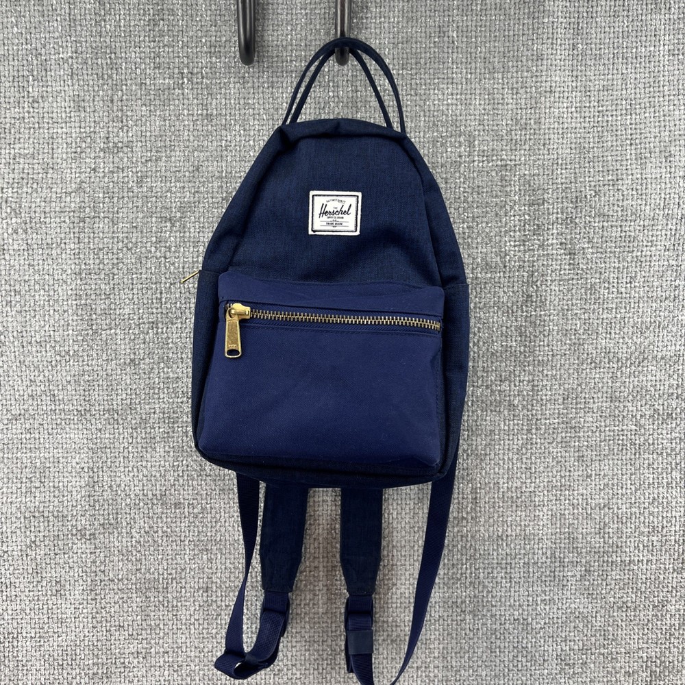 Herschel Nova Mini Backpack in Navy with 9L Capacity and Red White Pinstripe Lining Pockets Handle