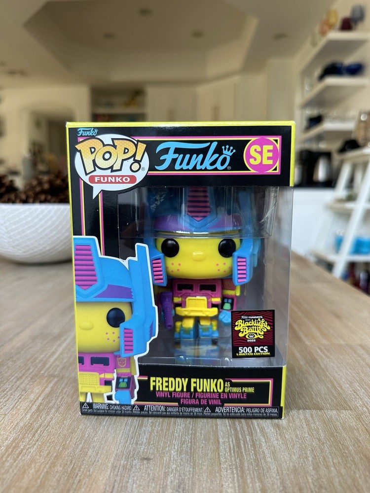 Freddy Funko As Optimus Prime Pop (Blacklight Battle) 2022 SDCC Fun days LE 500-image