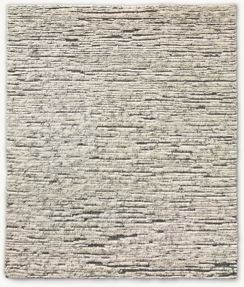 Hand knotted New Zealand wool rug with thick spun texture and hand-washed softness
