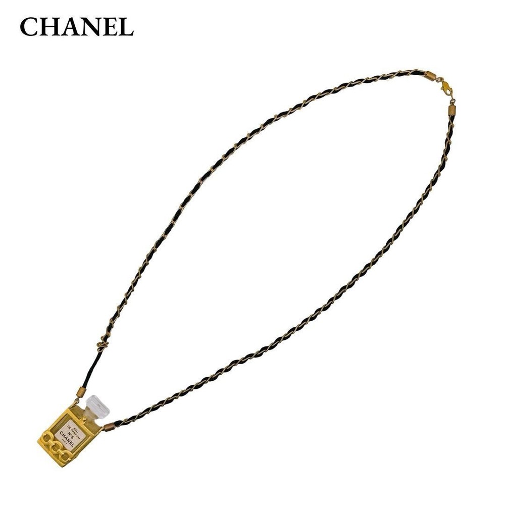 Chanel N5 Perfume Bottle Necklace Pendant in Black and Gold Elegant Vintage Jewelry