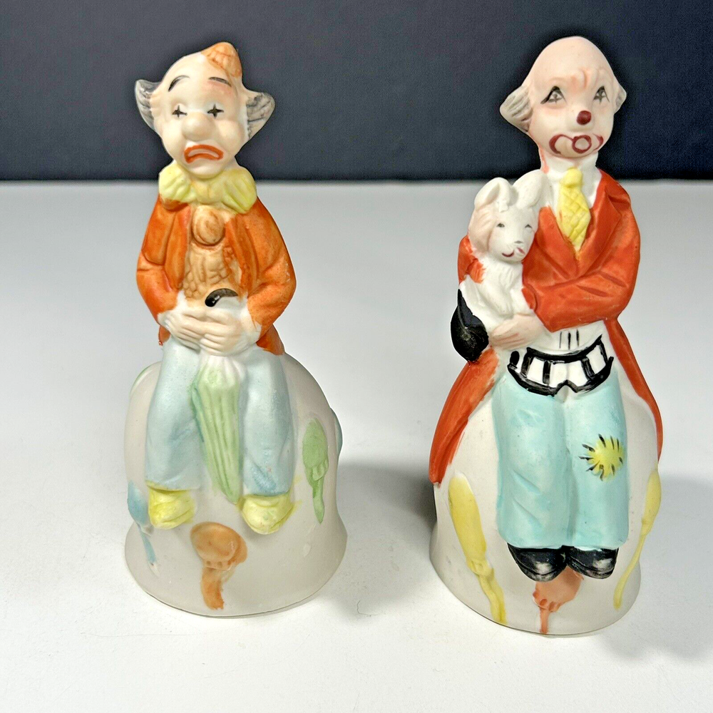 Vintage Sad Clown Ceramic Bells Holding Puppy & Umbrella Unglazed