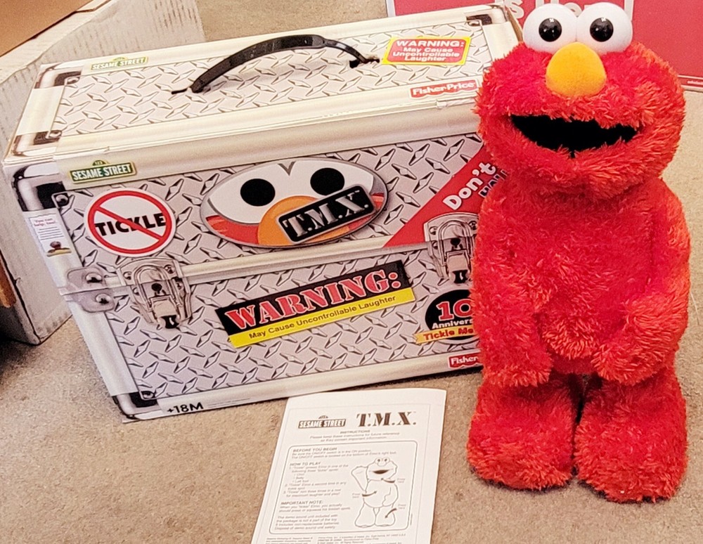 2006 TMX Tickle Me Elmo Top Secret 10th Anniversary Toy Gently used with Box