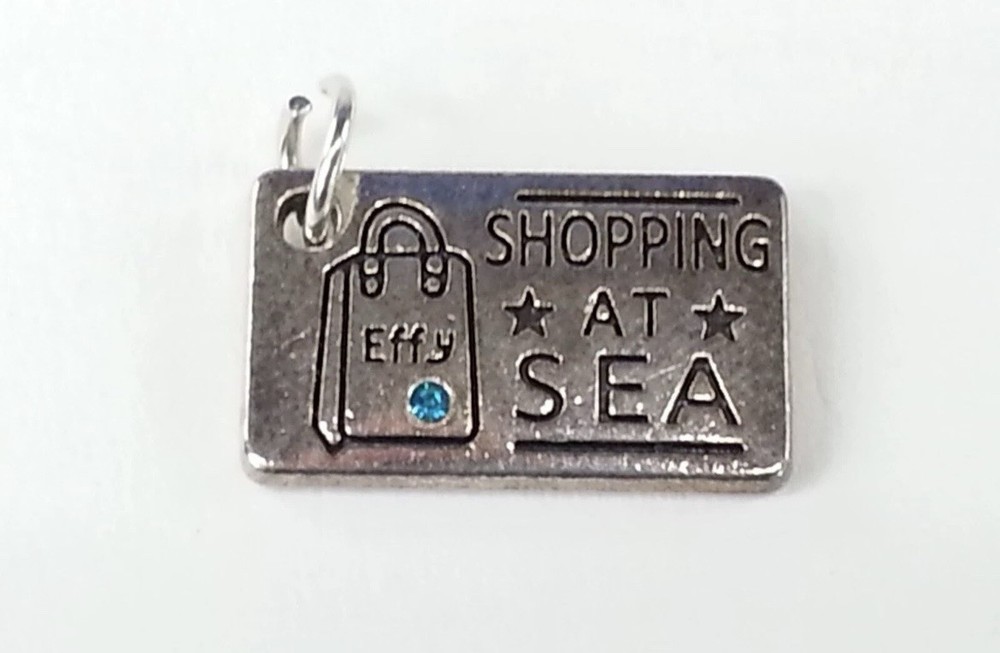 Effy  “ Shopping at Sea “ Charm Or Pendant With A Small  Blue Stone Silver Tone.